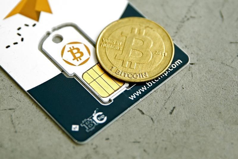 © Reuters.  Bitcoin Fiyatı 9000 Dolar Seviyesini Kırdı
